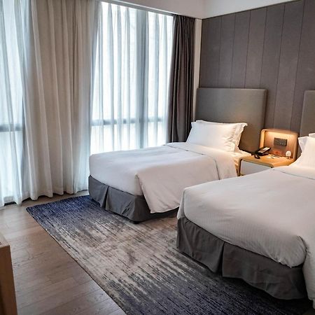 Ascott Raffles City Tsjoengking Buitenkant foto